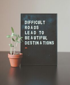 Difficult roads lead to beautiful destinations sign