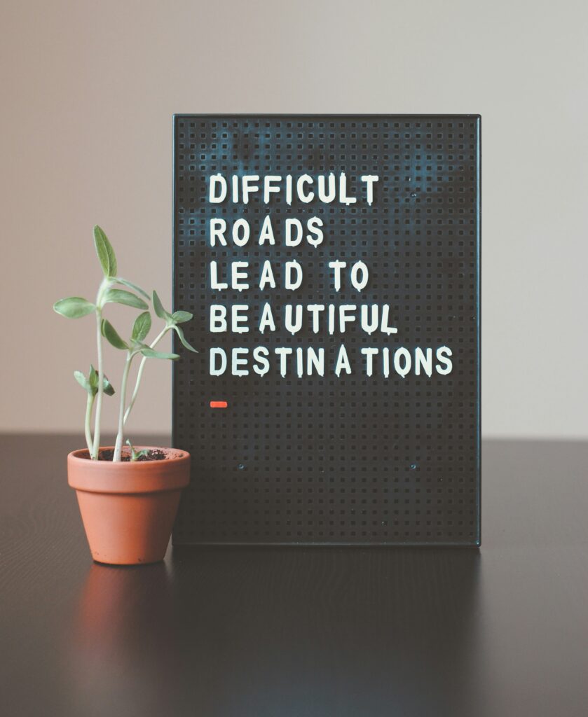 Difficult roads lead to beautiful destinations sign